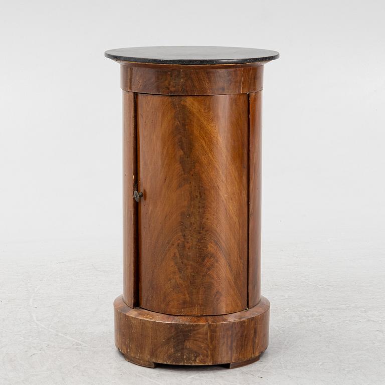 A mahogany veneered cabinet/bedside table with stone top, 19th Century.