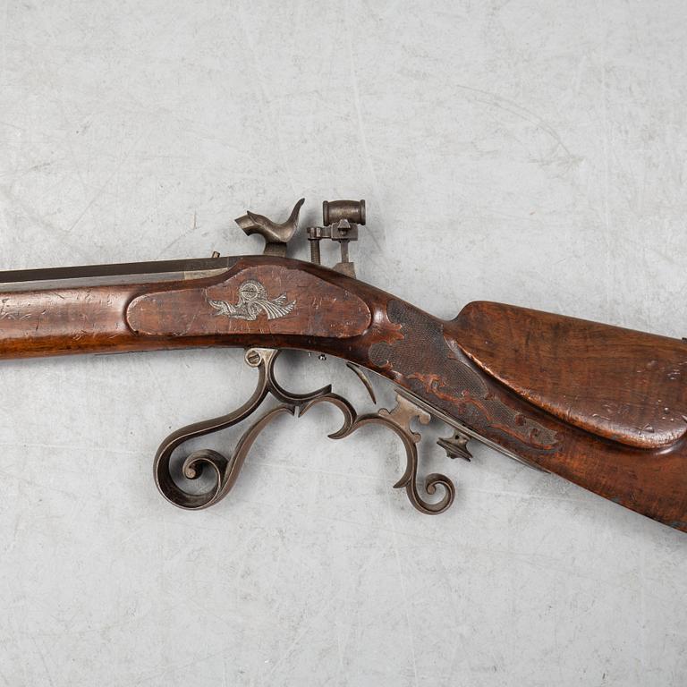 A pecussion rifle by John Donaghy, Amsterdam (1820-50).