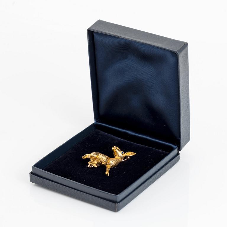 A Tiffany & Co 18K gold brooch.