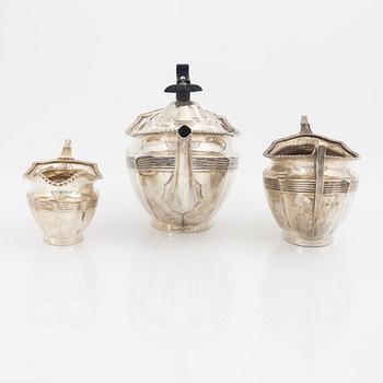 Barker Brothers (Herbert Edward Barker & Frank Ernest Barker), a silver teapot, creamer and sugar bowl, Chester 1924.