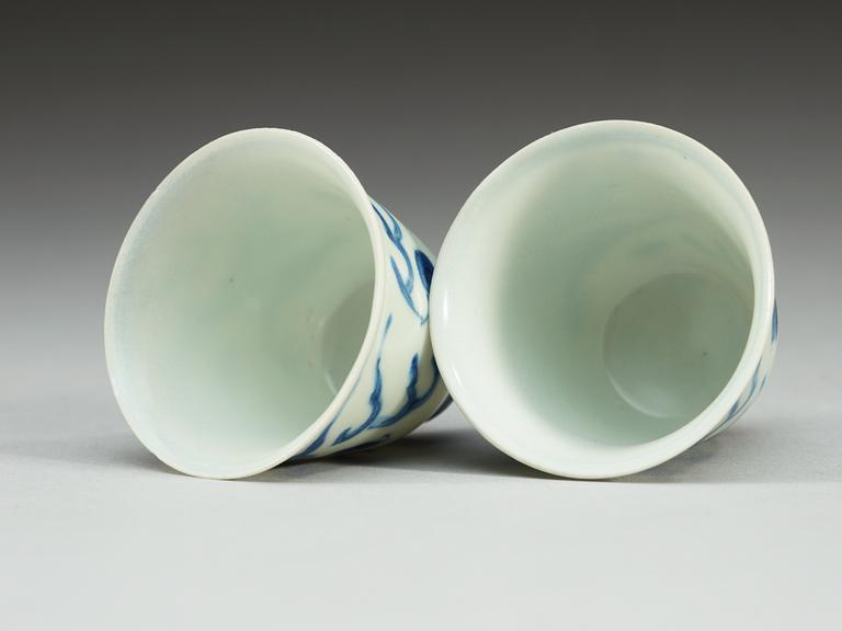 Two blue and white wine cups, Ming dynasty, Transition/Chongzhen (1628-44).