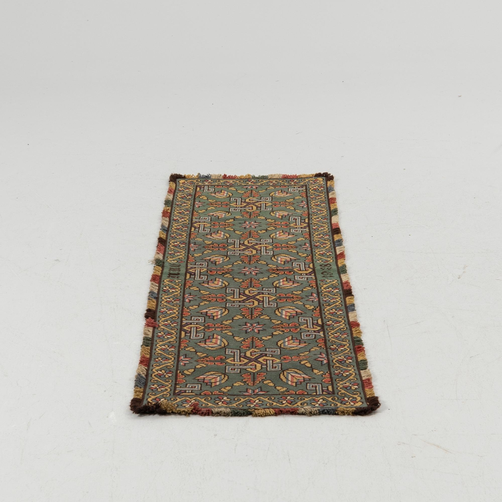 Sled cushion, dated 1938, approx. 180 x 52 cm.