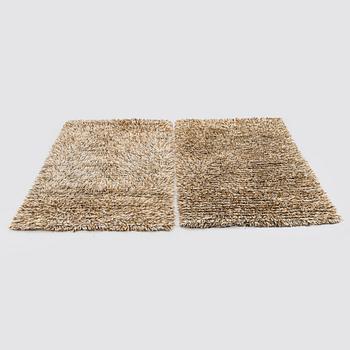 A pair of 1960s-70s rya rugs. Ca. 134 x 91cm and 133 x 91cm.
