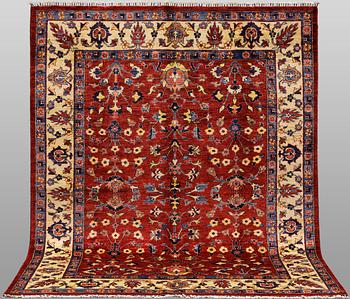 A rug, Ziegler design, approx. 246 x 177 cm.