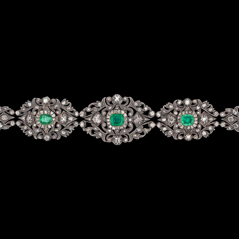 An emerald and antique cut diamond bracelet, 1950's.