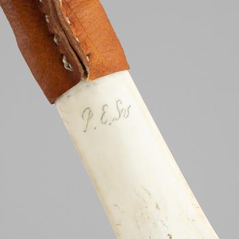 Per Erik Svonni, a Sami reindeer horn knife, signed P.E. Sv.