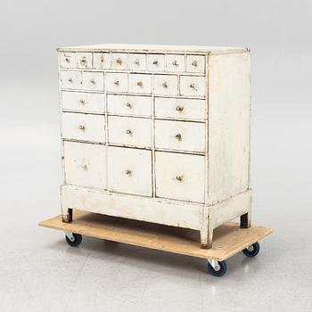 A painted chest of drawers, 20th Century.