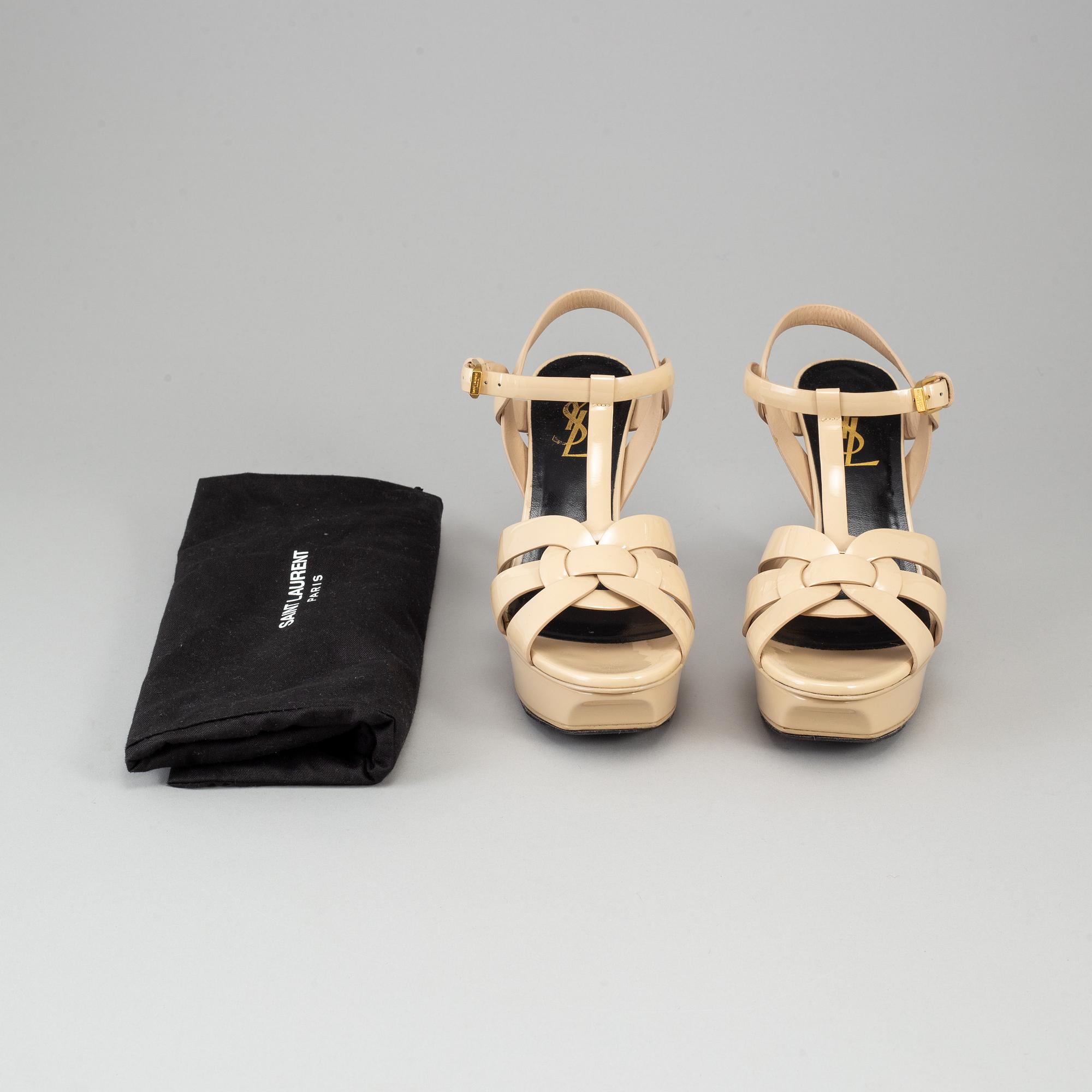 YVES SAINT LAURENT, a pair of open toe patent leather shoes, size 36½.
