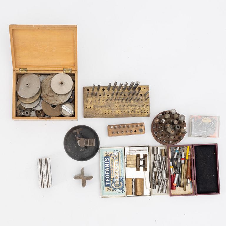 Watchmaking tools and spare parts, including a lathe by Lorch.