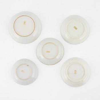 Two Chinese blue and white cups with saucers, a bowl and a dish, Qing dynasty, Jiaqing (1796-1820).