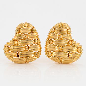 1052. A pair of 18K gold Tiffany earrings.