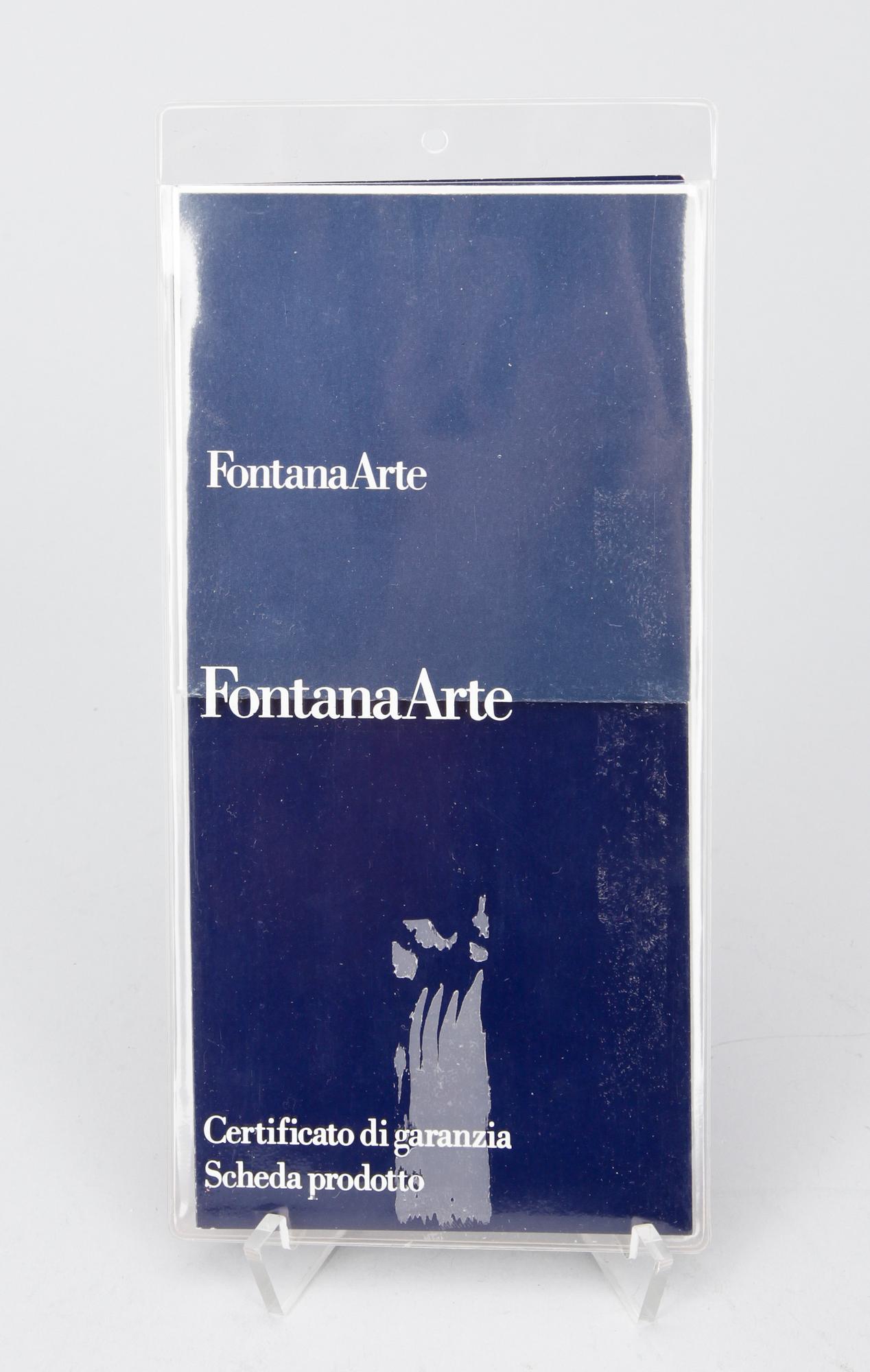 A Gae Aulenti 'Tavola con Ruote' table, Fontana Arte, Italy.