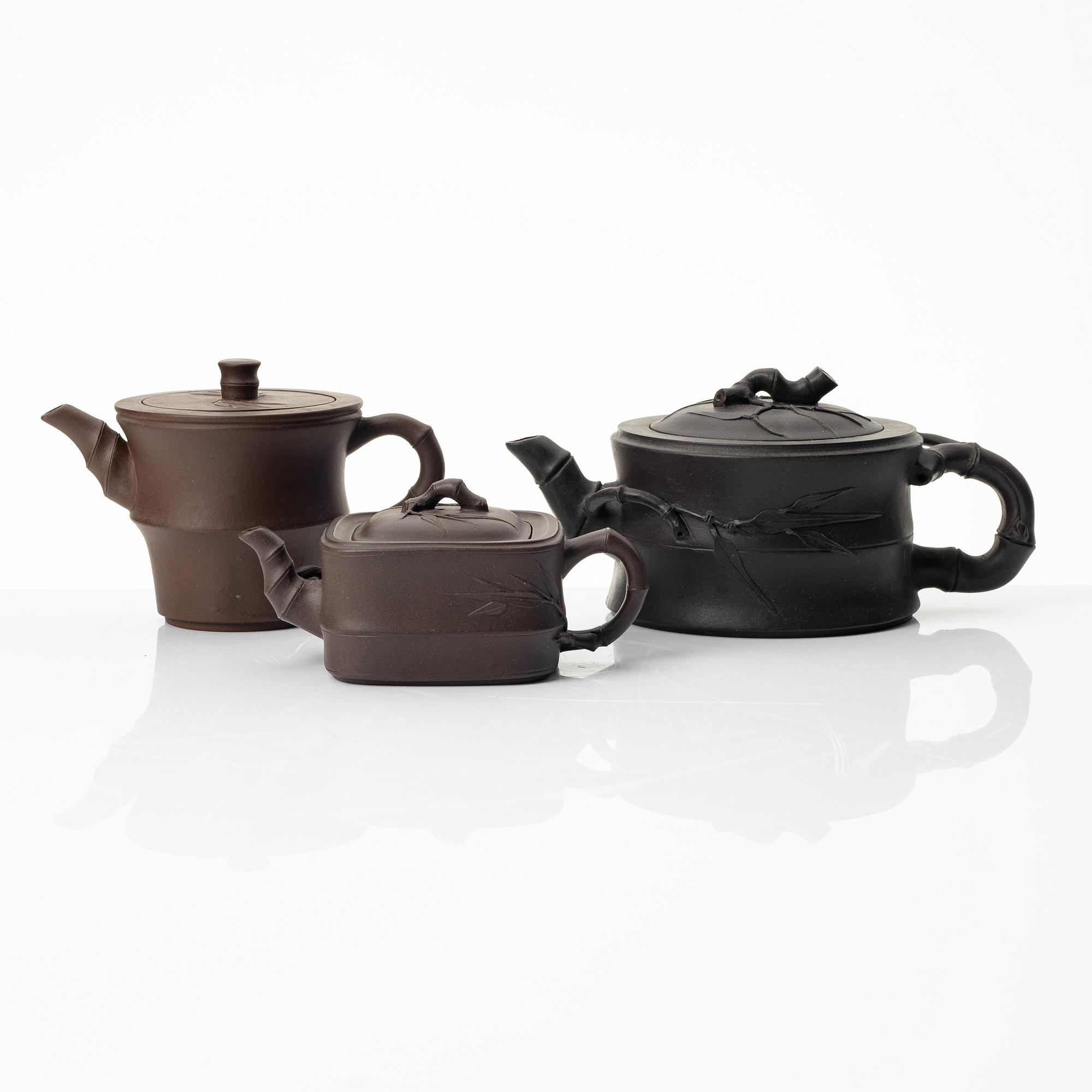 A group of Chinese yixing teapots, 1980s.