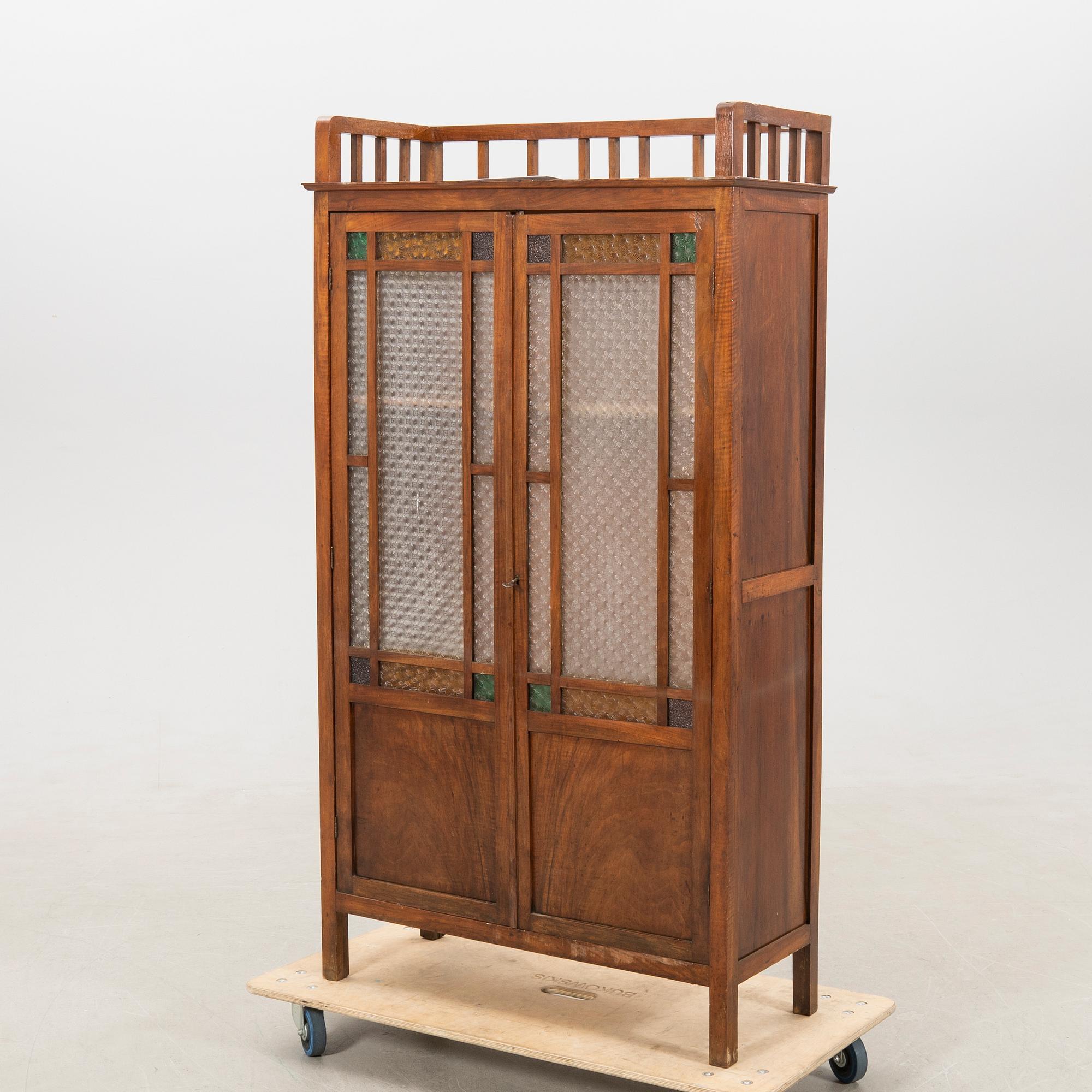 Cabinet, early 1900s.