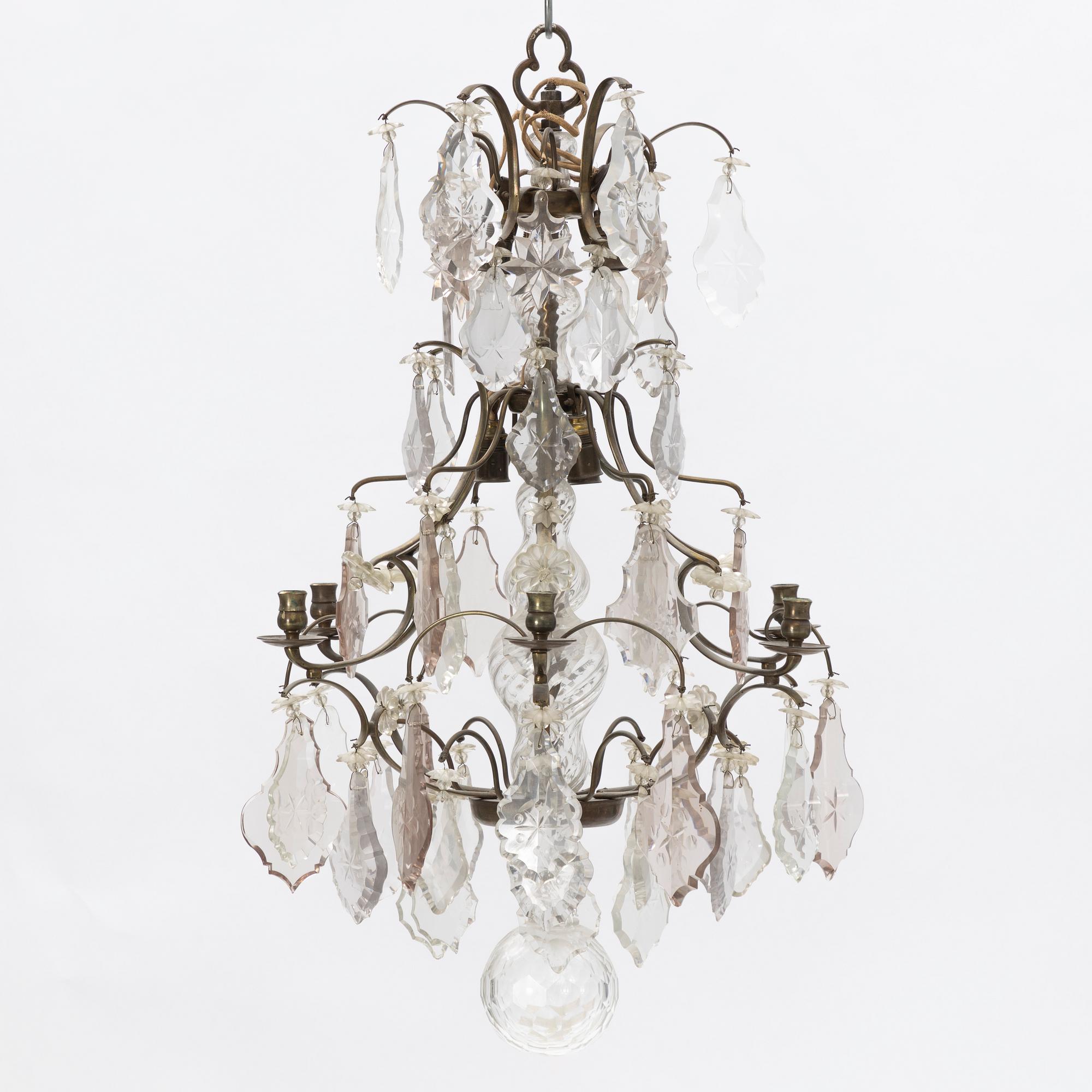 A six-light rococo-style chandelier, later part of the 20th century.