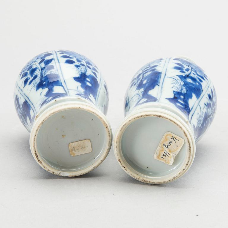 A set of two pairs of Kangxi and Kangxi style blue and white porcelain vases.