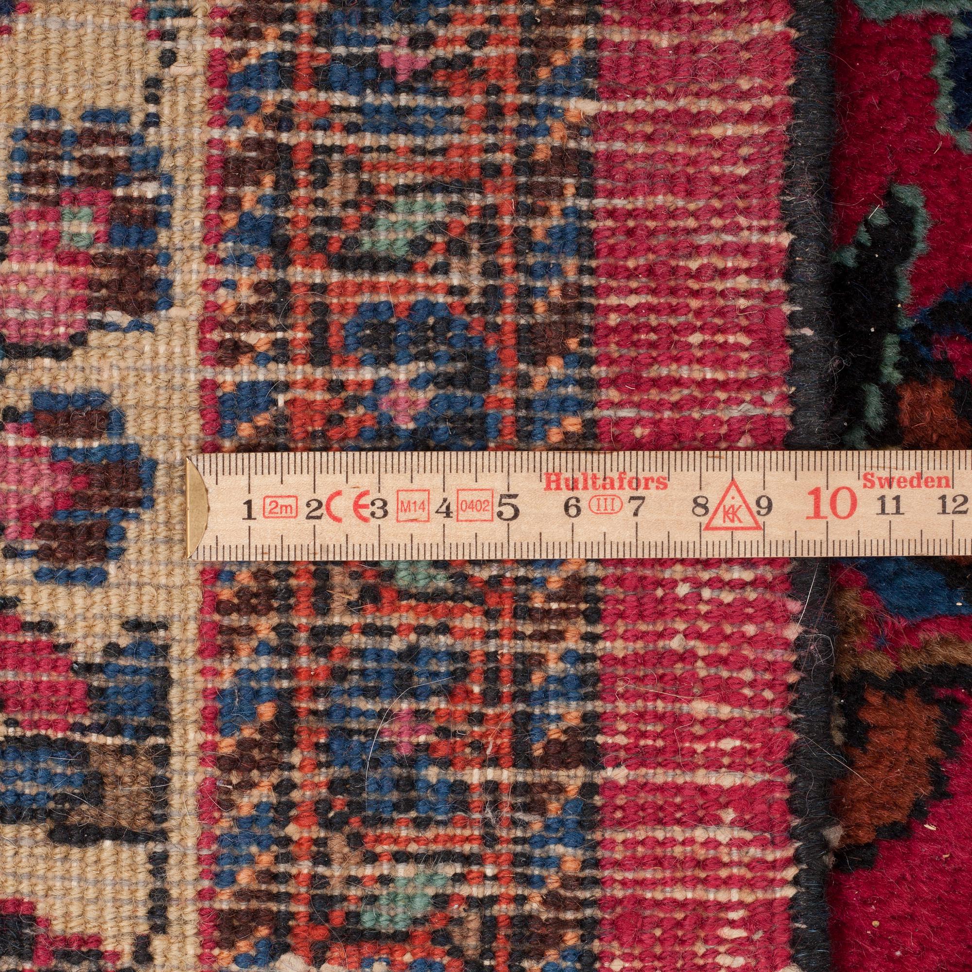 A CARPET FROM MASHAD, AROUND 417 x 307 cm.