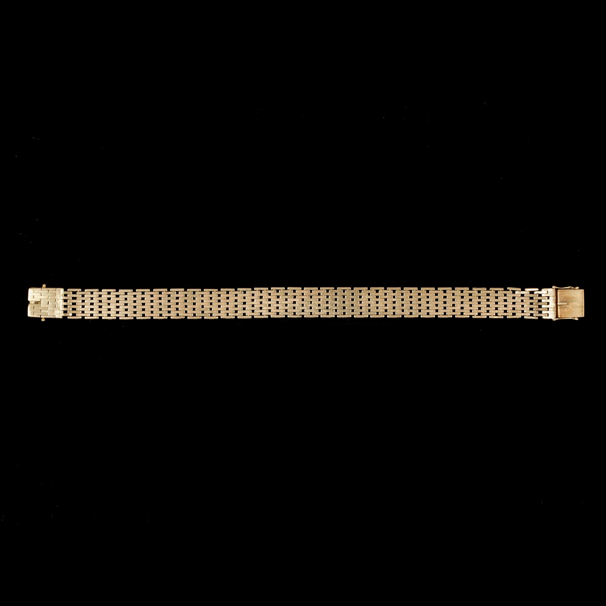 ARMBAND, 18 k guld, 1962. Vikt ca 33 g.