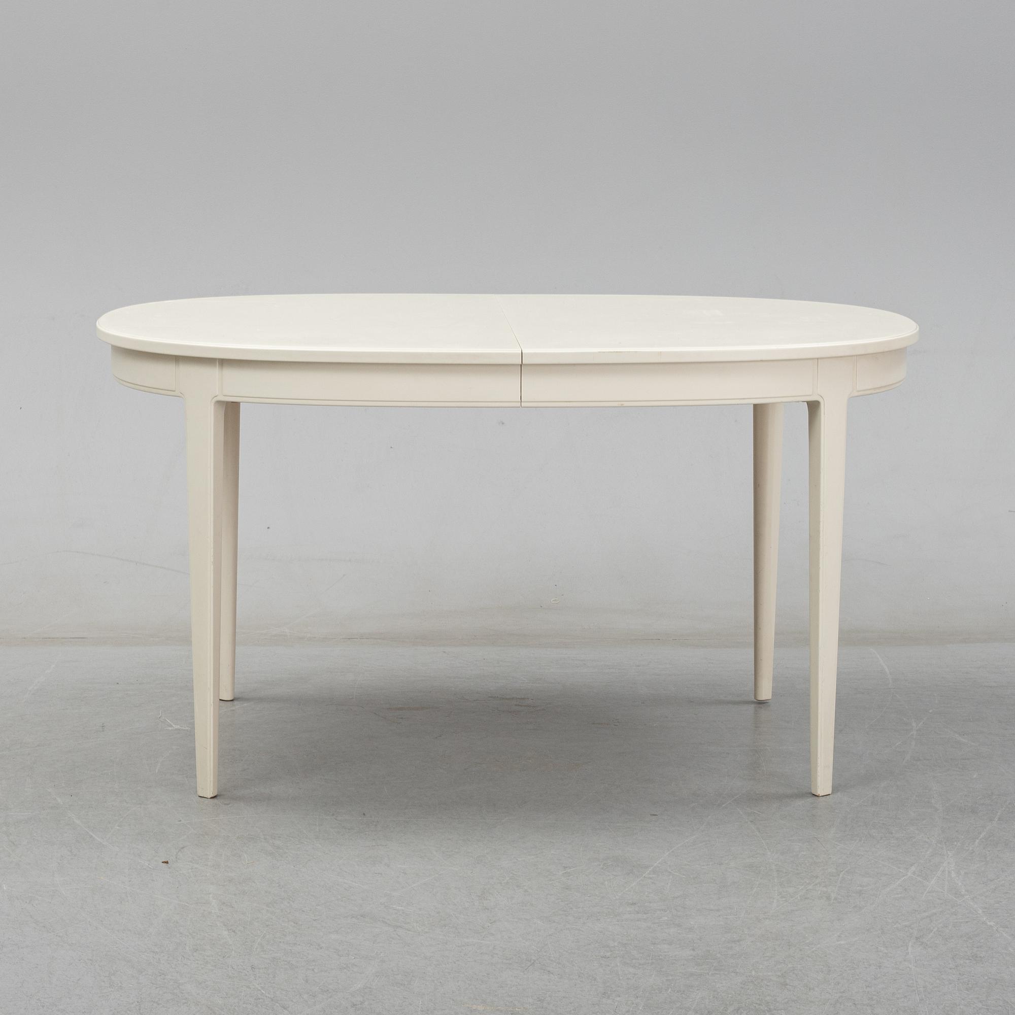 Carl Malmsten, A dining table with four chairs, Bodafors 1960's.