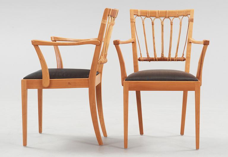 A pair of Josef Frank mahogany and rattan armchairs, Svenskt Tenn, model 1165.