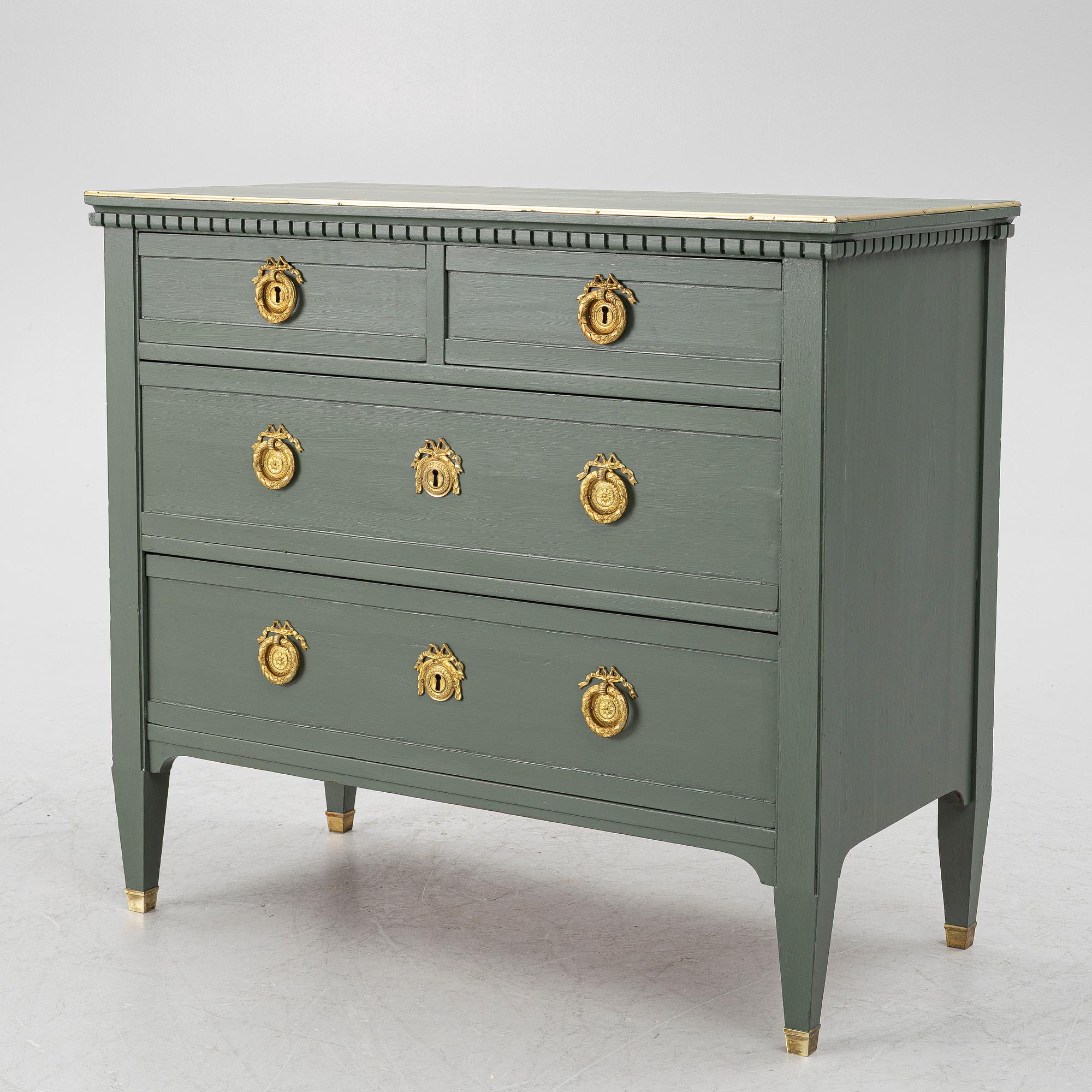 A Gustavian style chest of drawers, circa 1900.