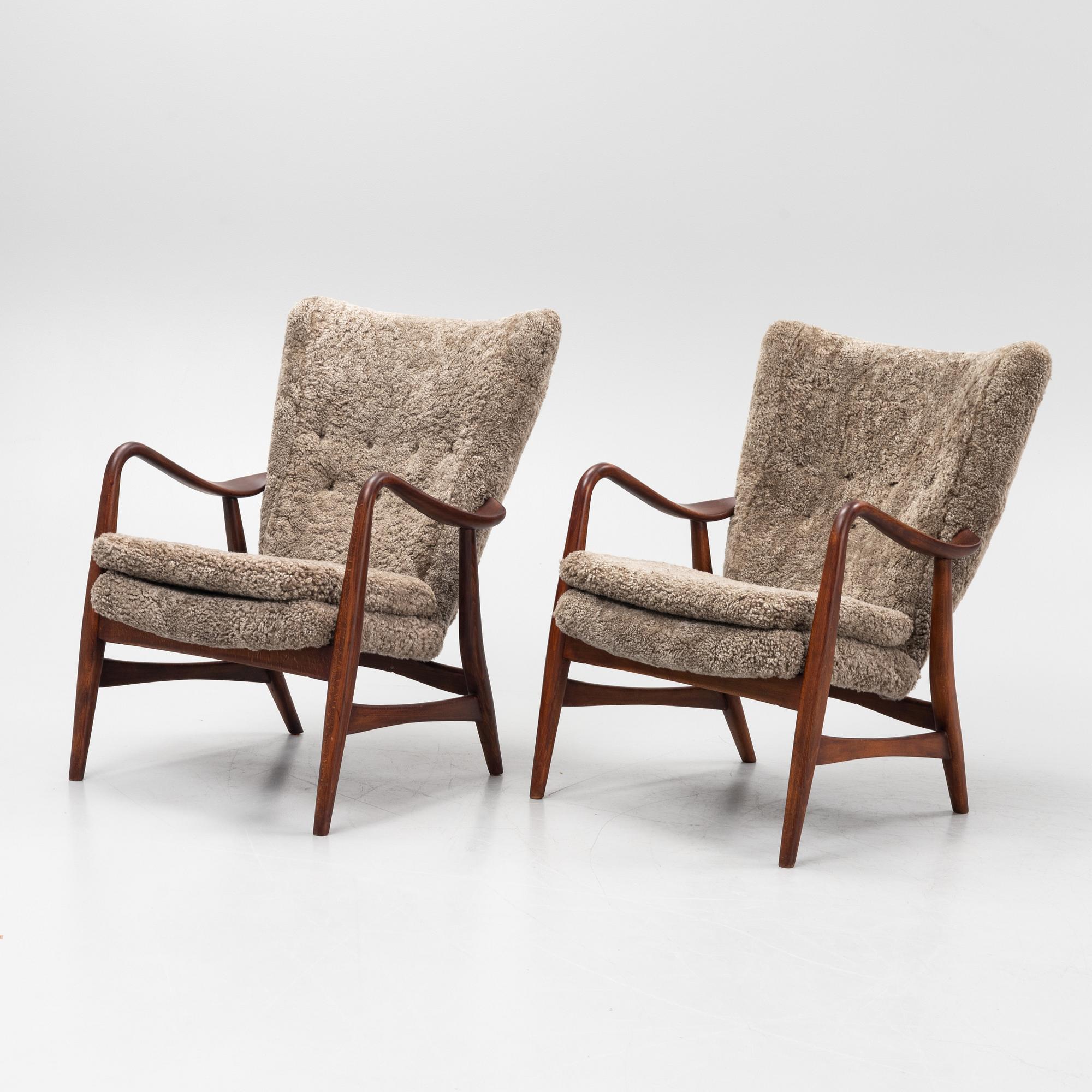 Ib Madsen & Acton SChubell, a pair of 'Pragh' armchairs, Madsen & SChubell Co, Denmark, 1940's/50's.
