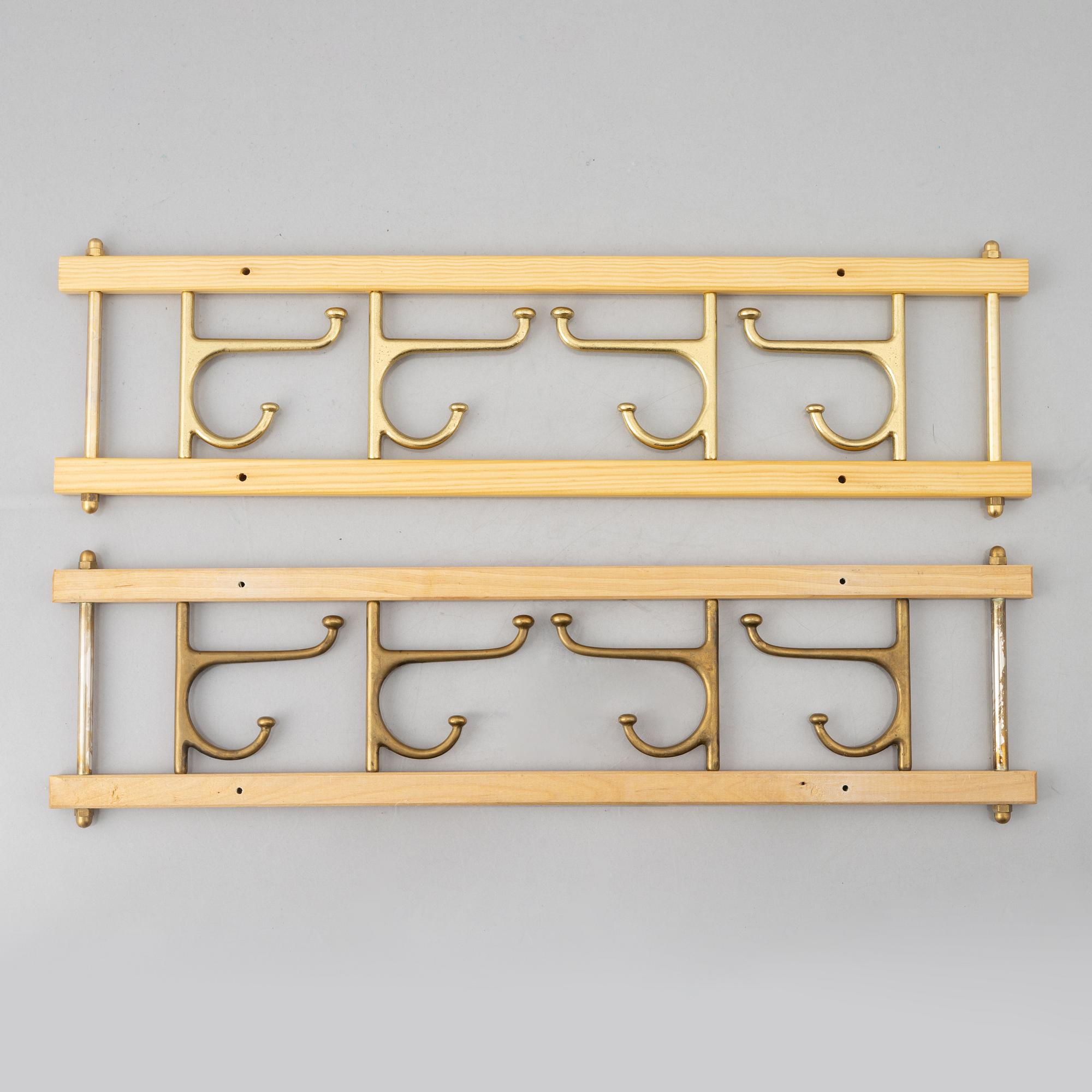 A pair of 'Dekorativ' coat hangers, Skoglunds metallgjuteri, Anderstorp, 1950's/60's.