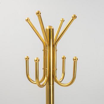 A brass clothes hanger. England, second half of the 20th century.