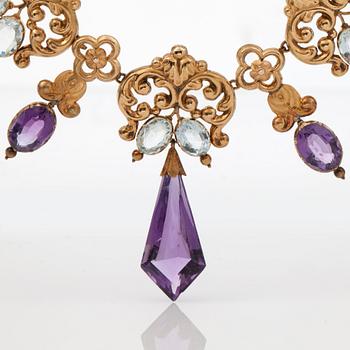 A Victorian amethyst and aquamarine necklace.