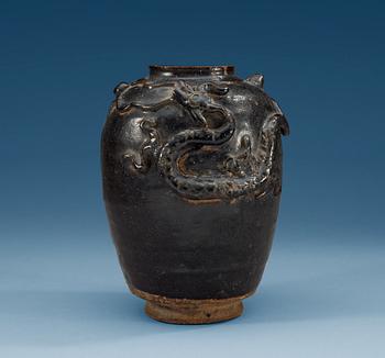 1418. A black and brown glazed jar with a dragon in relief, Song dynasty (960-1279).