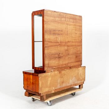 A walnut Art Deco early 1900s display cabinet.