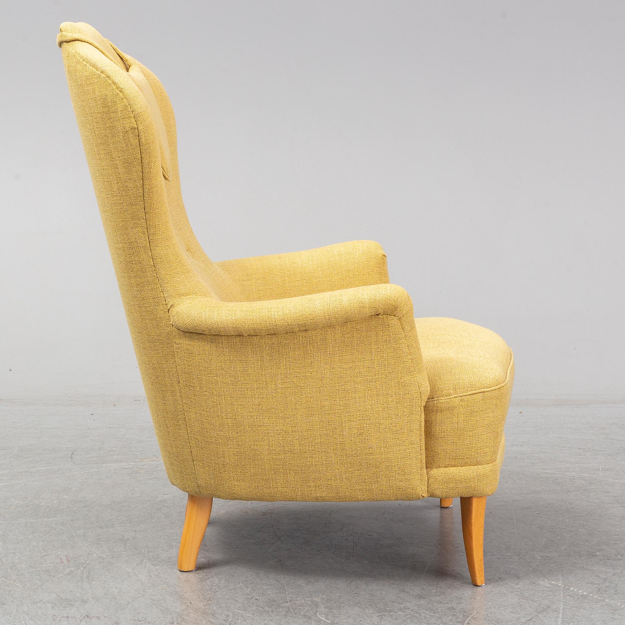 A Carl Malmsten ' farmor' chair.
