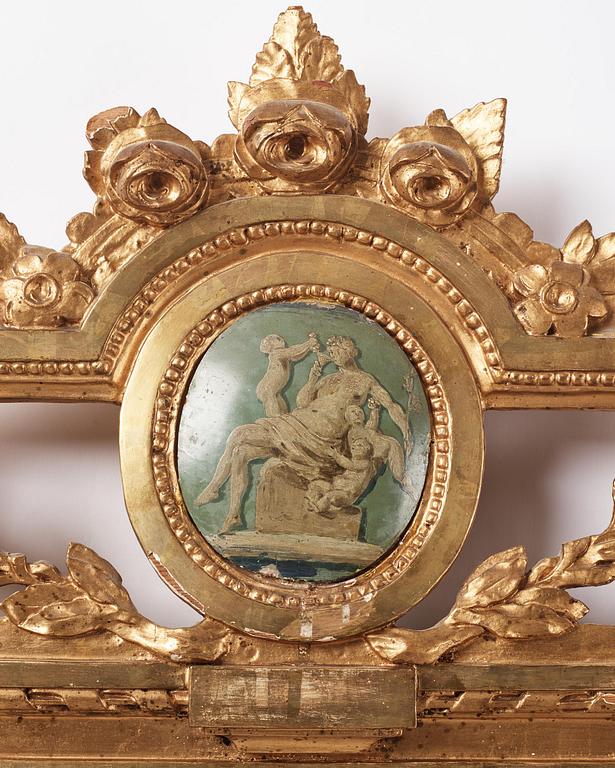 A Gustavian giltwood two-branch girandole mirror, Stockholm, late 18th century.