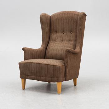 Carl Malmsten, an 'Åldermannen' armchair, second half of the 20th Century.