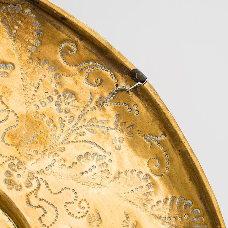 Four mid-17th century Northern and Central European reflectors plates.