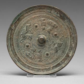 574. A bronze mirror, Tang dynasty (618-907).