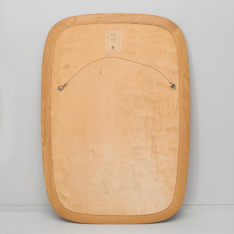 A mirror by Fröseke AB, model "No 603 Kristina", from the latter half of the 20th century.