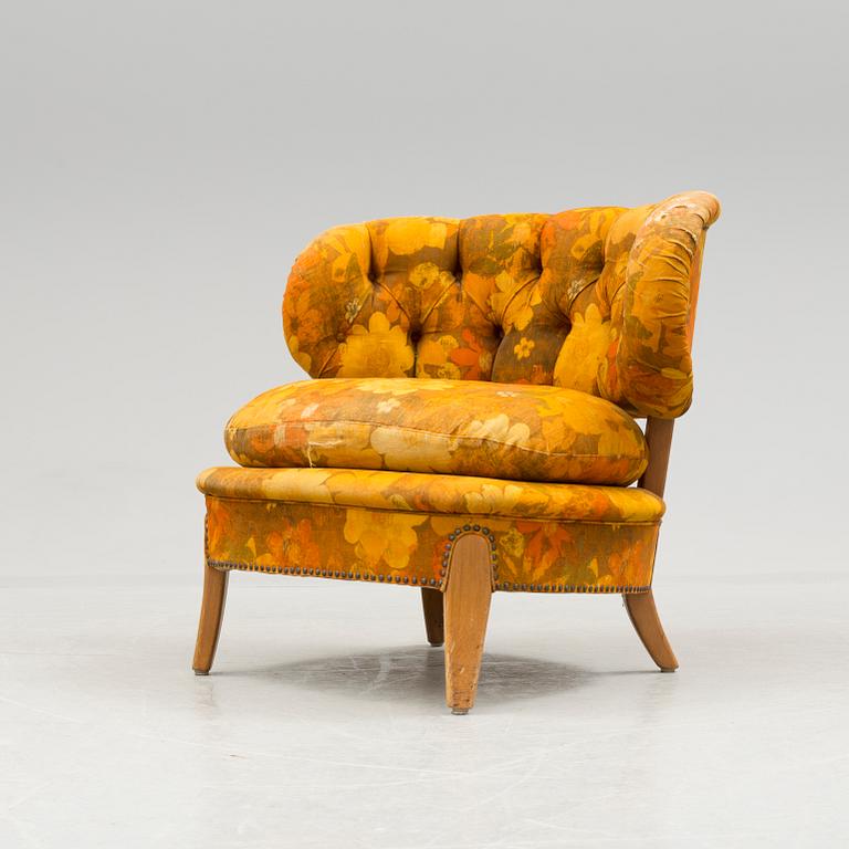 A mid 20th century "Schulz" easy chair by Otto Schulz.
