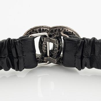 Chanel, a leather and rhinestone belt.