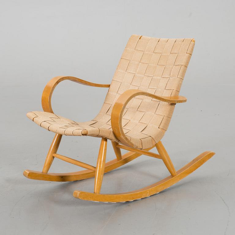 A 1940s possibly Yngve Ekstrom rocking chair.