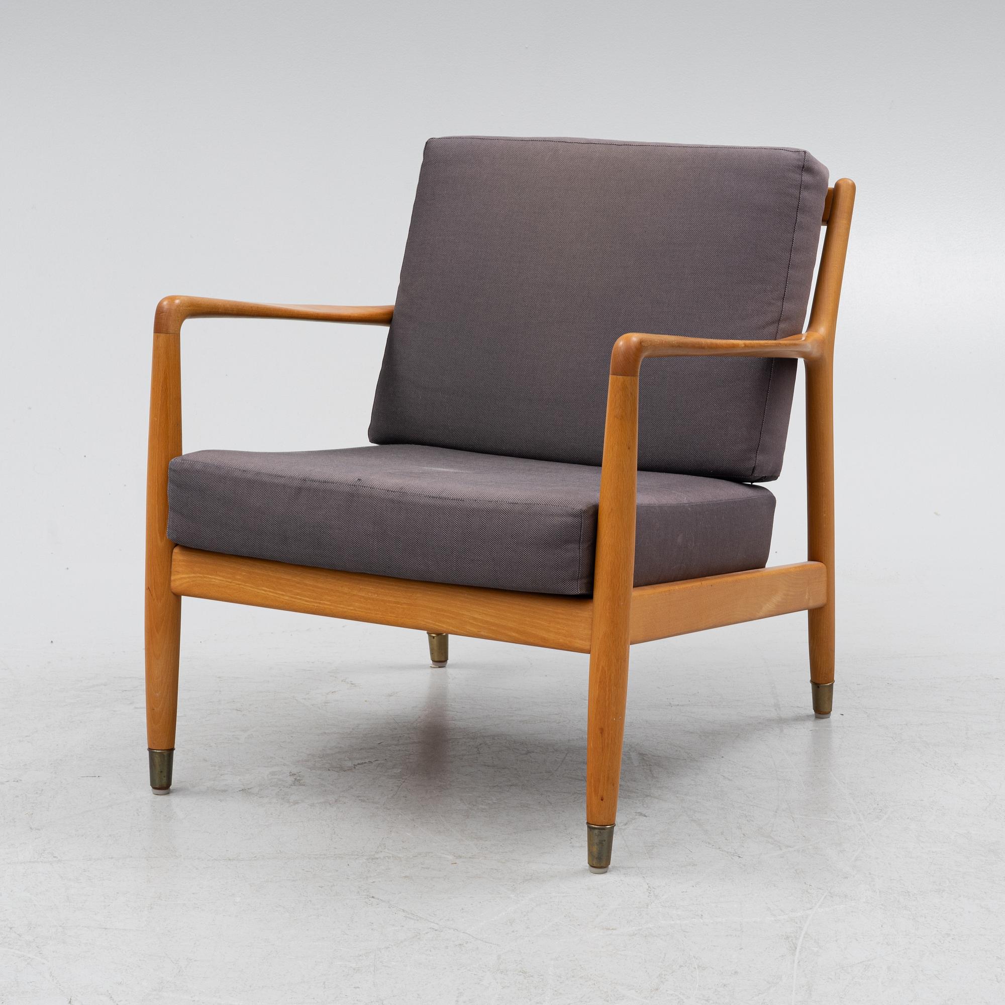 Folke Ohlsson, a beech 'USA-143' armchair, designed in 1953.