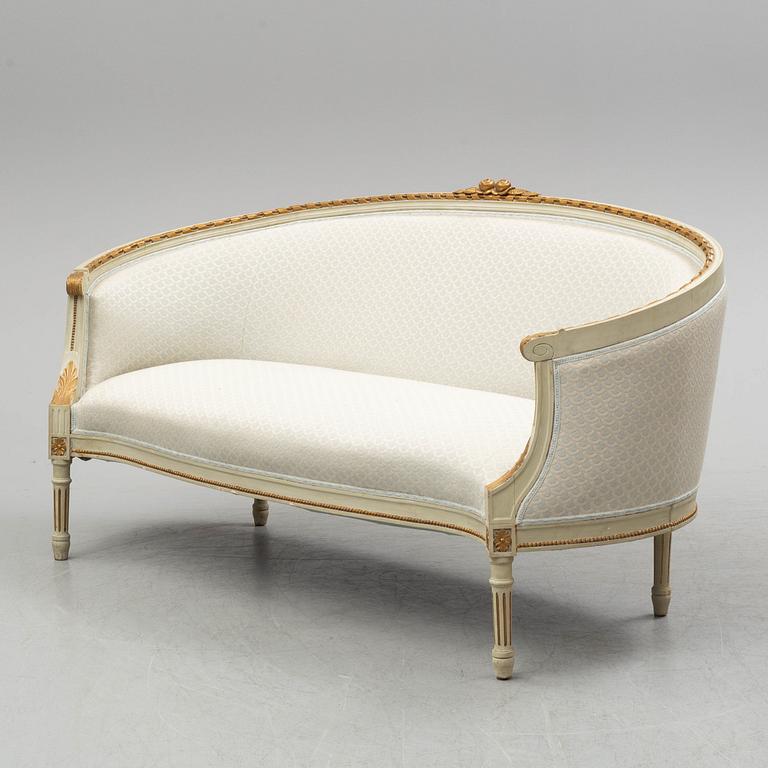 A sofa, four chairs and a table, gustavian style, early 20th century.