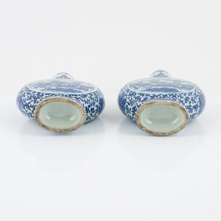 A matched pair of blue and white moon flasks, Qing dynasty, late 19th century.