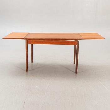 A Danish 1960s teak dining table.