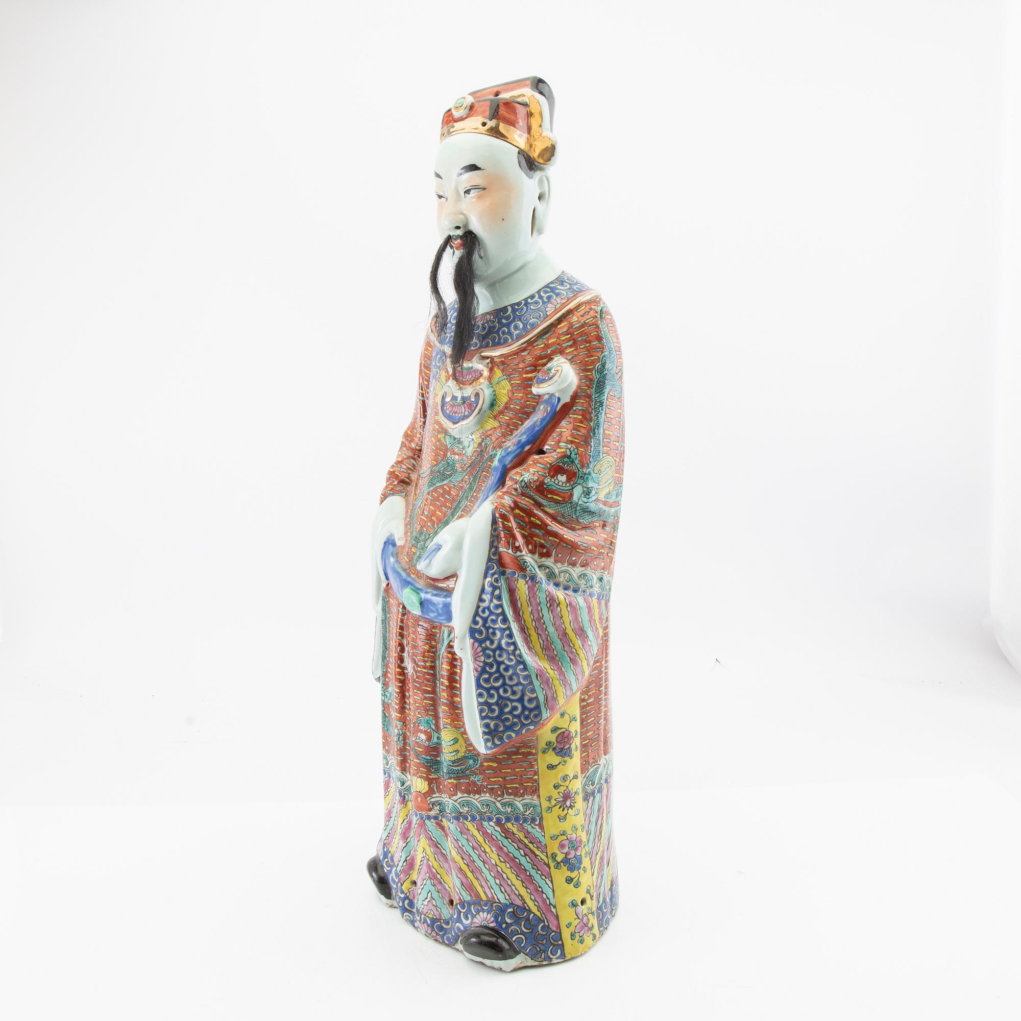 A Chinese porcelain figure, 20th century.