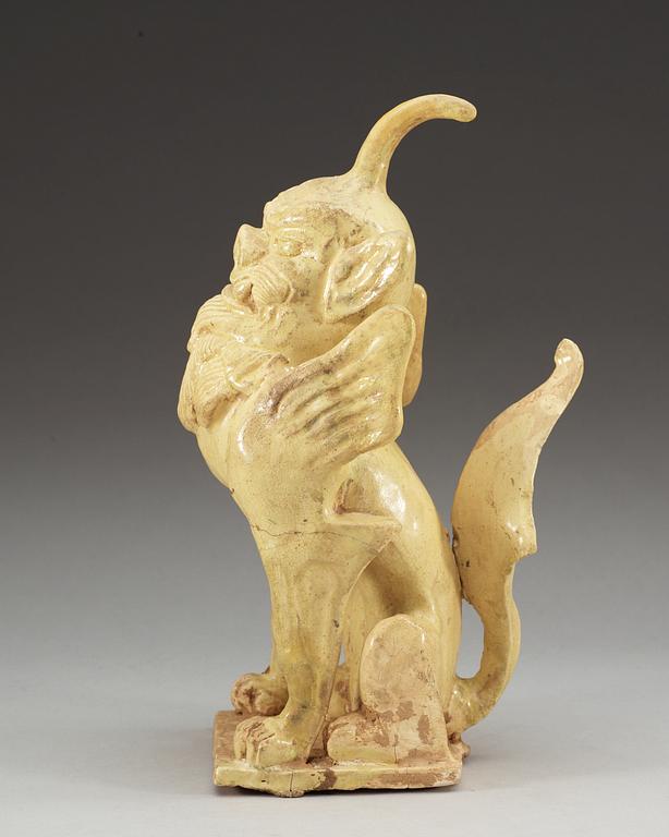 A yellow glazed pottery guardian, Tang dynasty (618-907).