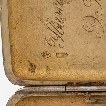 A silver cigarette case, Moscow, dated 1916.