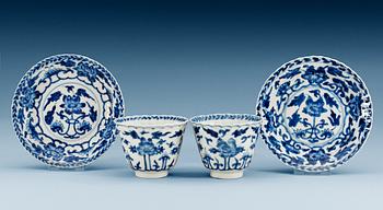 1692. A pair of blue and white cups with stands, Qing dynasty, Kangxi (1662-1722).