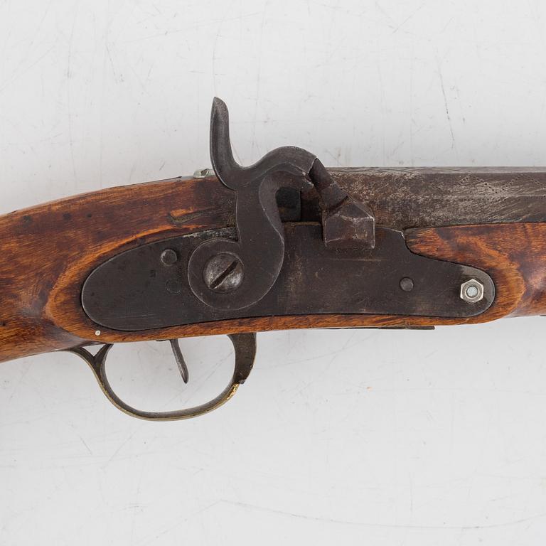 A percussion gun, 19th century.