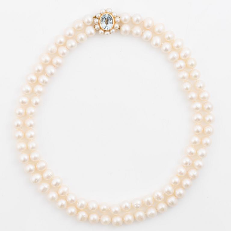 Pearl necklace, double-stranded with cultured freshwater pearls, clasp 18K gold set with aquamarine and cultured pearls, Jarl Sandin.